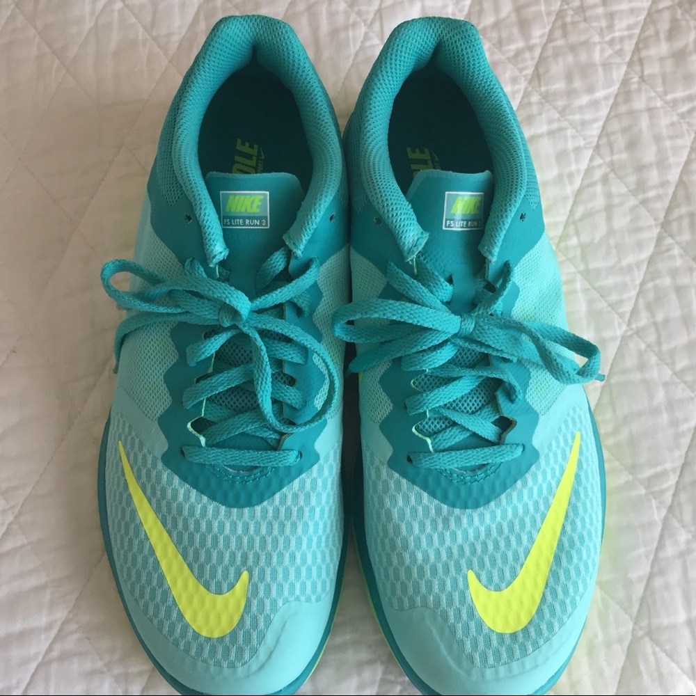 Ladies Nike running shoes, worn once! Great shape!